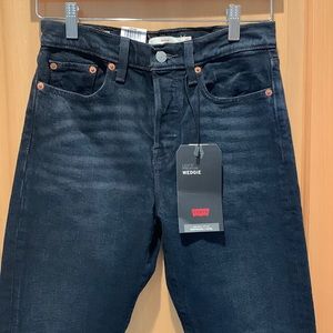 Levi’s premium Wedgie black jeans in size 25.
